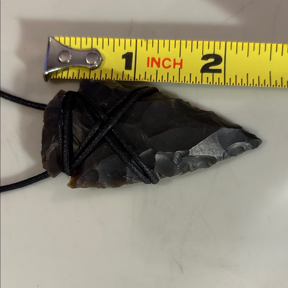 Arrowhead Pendant Necklace, not sure what it is made of ?, I know !